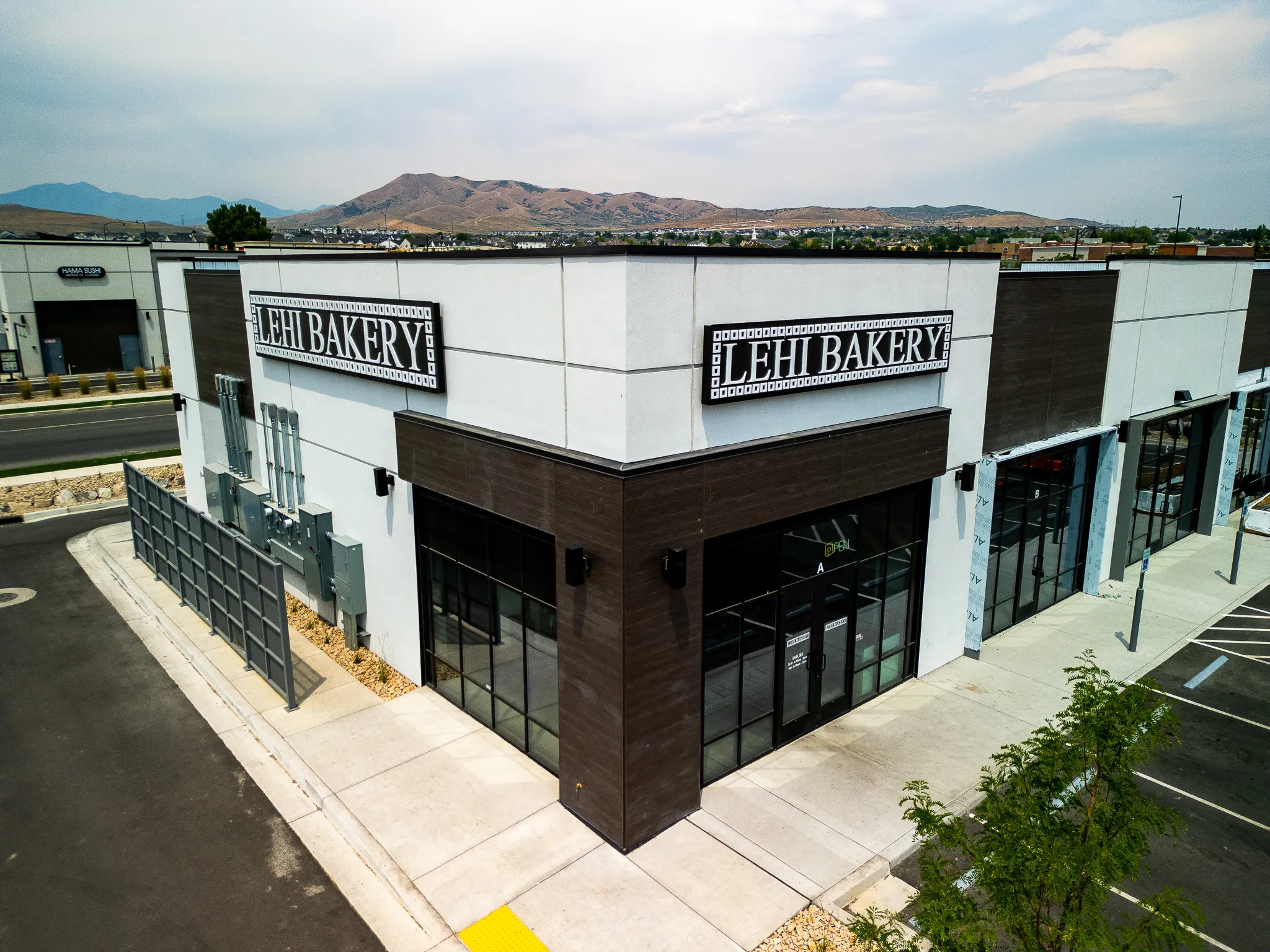 Lehi Bakery from above with Utah County mountains framing the rear of the building